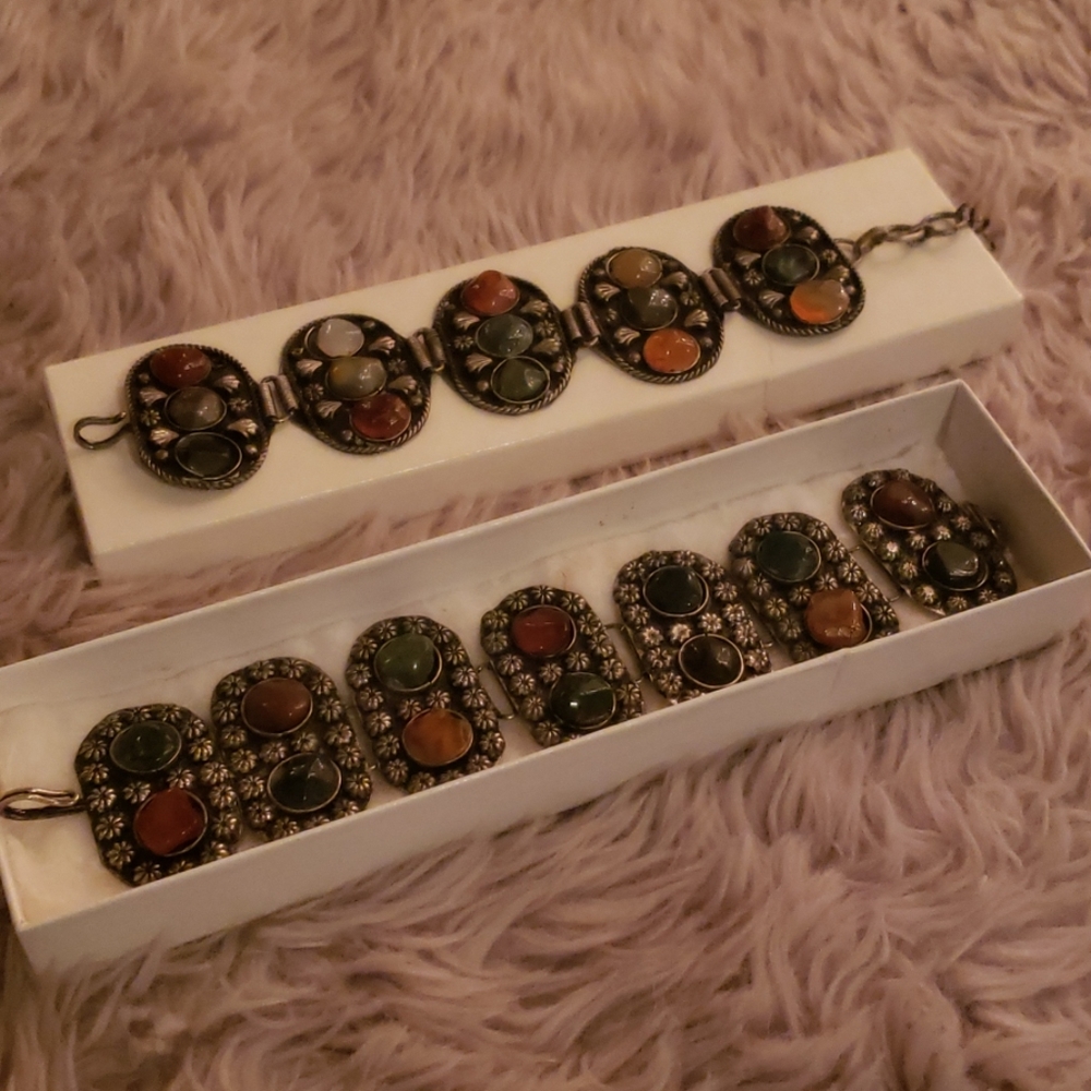 Silver bracelets set with various stones